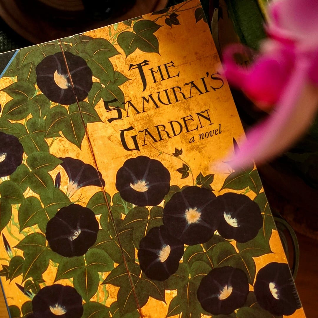 a copy of the book The Samurai's Garden by Gail Tsukiyama